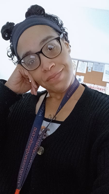 Image of woman in glasses and headband as Avenues Recovery shares Ariel's story