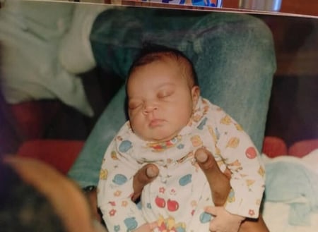 Image of sleeping infant as Avenues Recovery shares Ariel's story