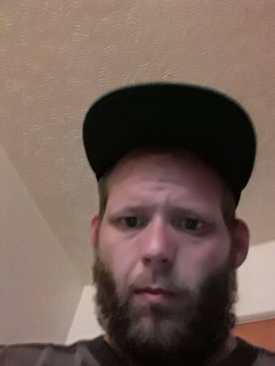 Image of black baseball cap as Avenues Recovery shares AJ's story