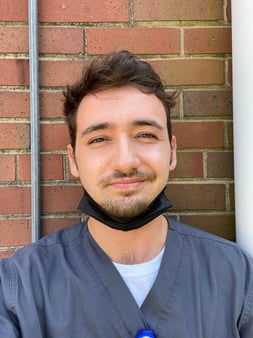 Image of man in scrubs and mask as Avenues Recovery shares Derrick's story