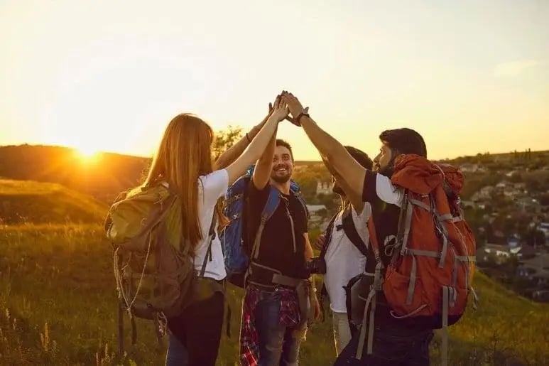 A support group enjoying the outdoors during adventure therapy for addiction