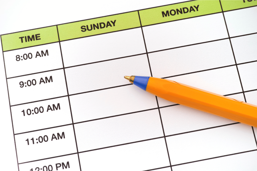 Daily schedule planner with pen. What is the daily schedule for PHP treatment like?