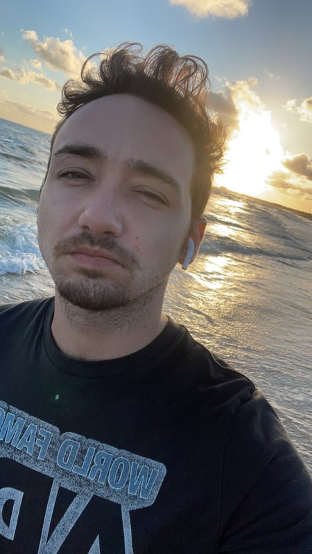 Image of man on beach at sunrise as Avenues Recovery shares Derrick's story