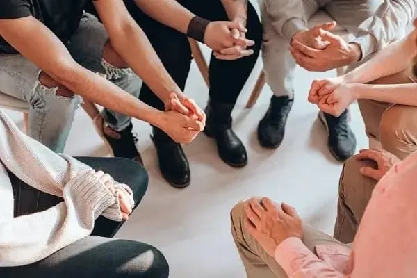 Addiction recovery group circle. This list of recovery words includes common recovery programs.