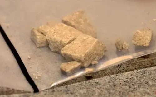 Close-up illustration of heroin, often cited as one of the most addictive substances