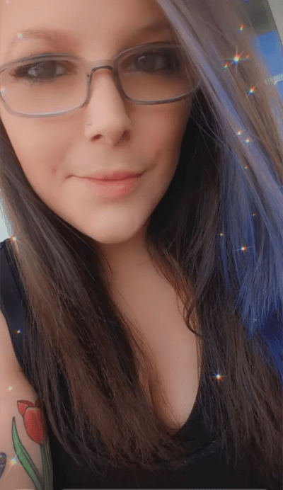 Image of woman in glasses as Avenues Recovery shares Casey's story