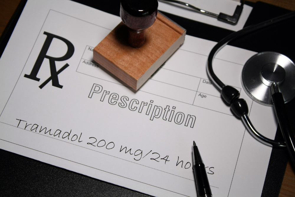 A prescription bottle of tramadol, representing how medically approved use can still lead to tramadol addiction.