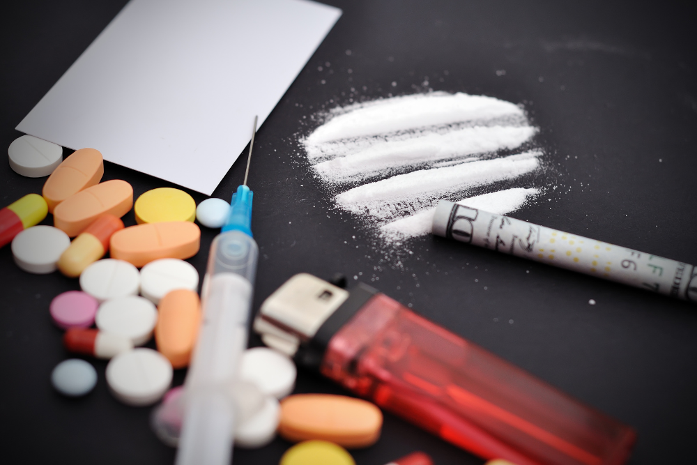 Assortment of drugs in the form of pills, powder and a syringe