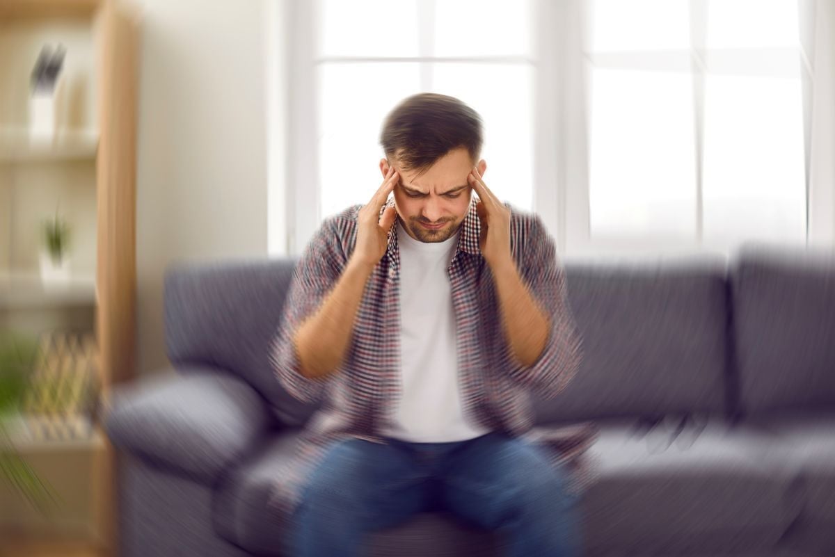 Image of man feeling dizzy as Avenues Recovery explores Phenibut