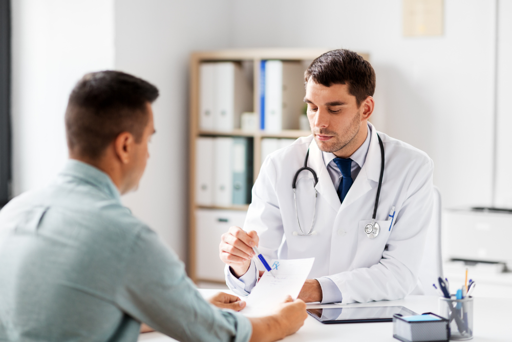 Doctor guiding a man with tapering off bupropion to avoid severe Wellbutrin withdrawal symptoms. Avenues Recovery.