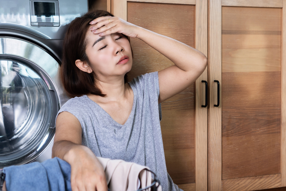 Woman appearing drowsy and physically weak, showing common symptoms of Valium addiction.