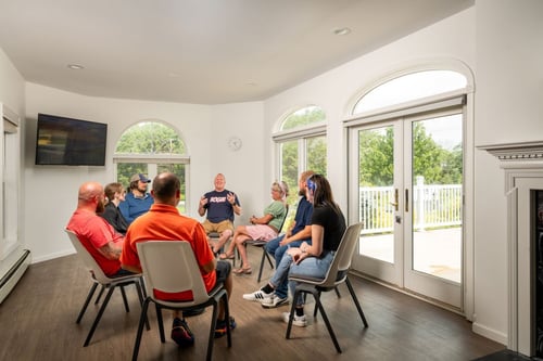 Group therapy session at Avenues Recovery Lake Ariel as Avenues Recovery shares helpful Pennsylvania Crisis Helpline Numbers