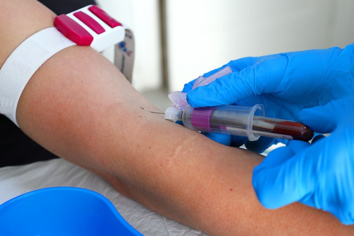 Image of person having blood drawn as Avenues Recovery explains how long does Valium stay in your system