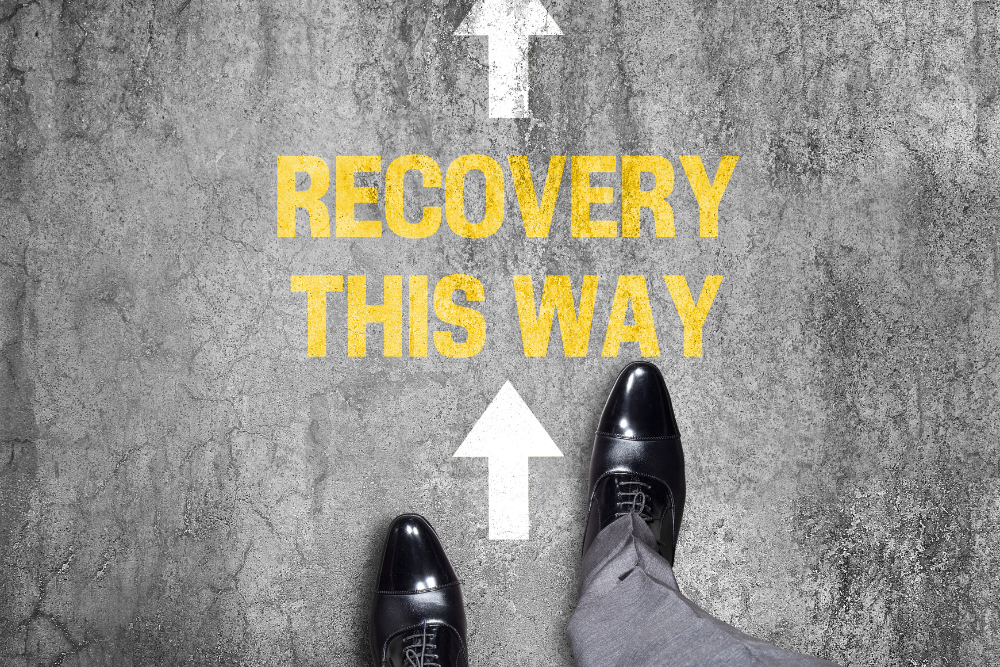 Directional road sign for recovery, related to Tramadol addiction treatment.