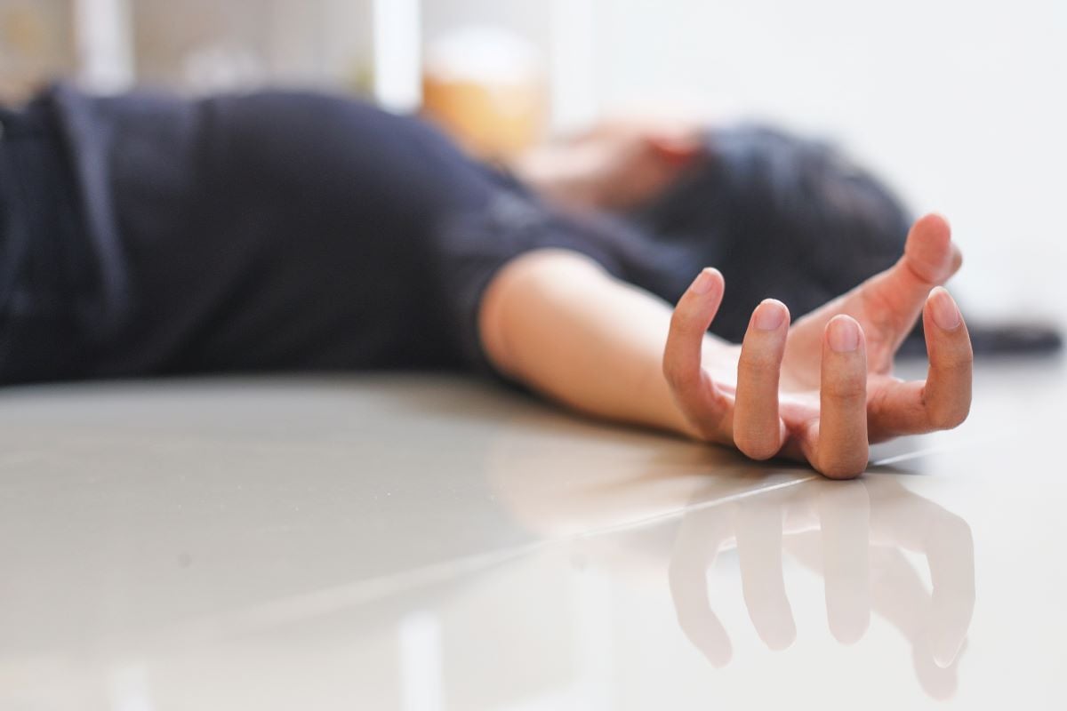 Image of person unconscious on floor as Avenues Recovery explains how long does valium stay in your system