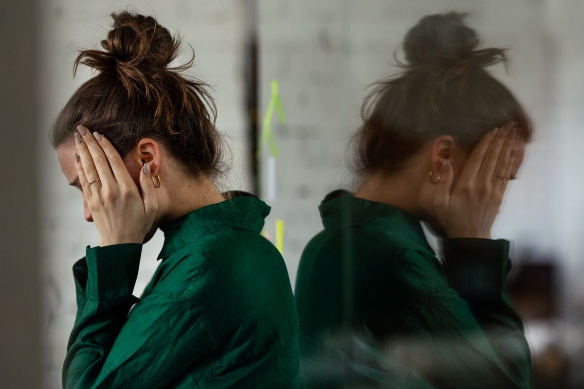 Image of distressed woman in green shirt as Avenues Recovery explores Pyro
