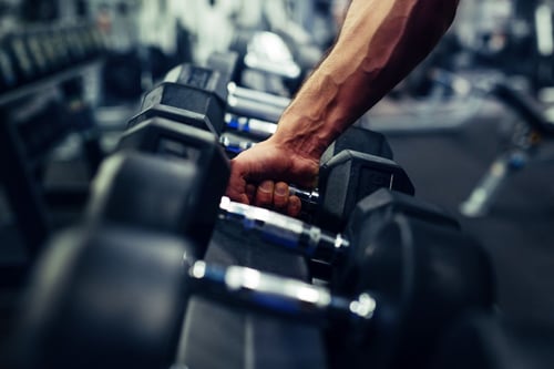 Image of barbell as Avenues Recovery explains what is anabolic steroid abuse